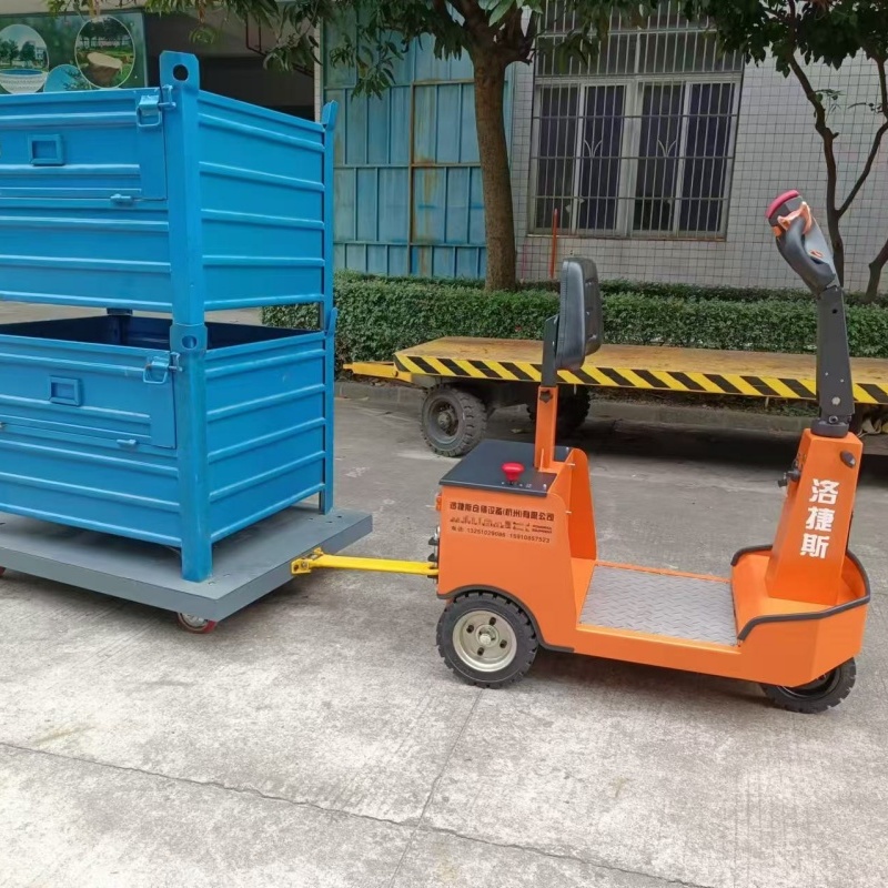 手柄站立式迷你型电动牵引车 座驾式小型牵引头 转运自动拖车头