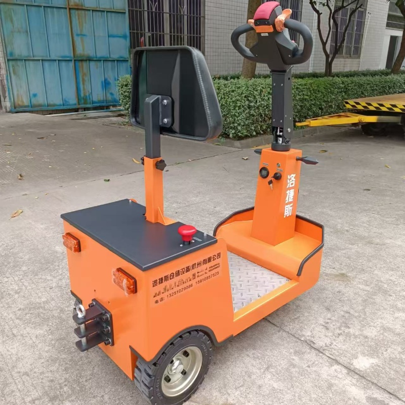 手柄站立式迷你型电动牵引车 座驾式小型牵引头 转运自动拖车头