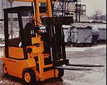 Pallet turnover clamp